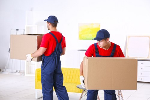 House removalists loading furniture in Erith outside a residential property