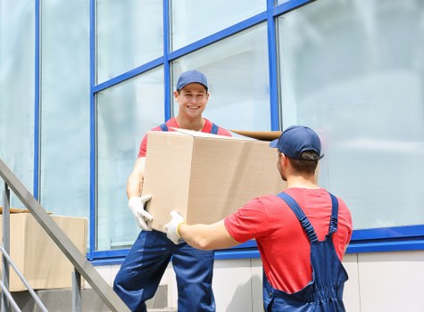 Packed boxes and furniture ready for a home removal in Erith