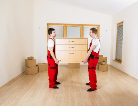 Loading furniture and boxes into a removal van in Erith