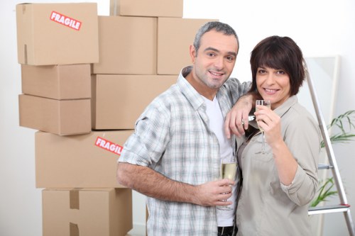 Local movers loading furniture for a property move in Erith